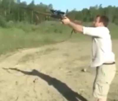 Really not the right way to hold a gun!