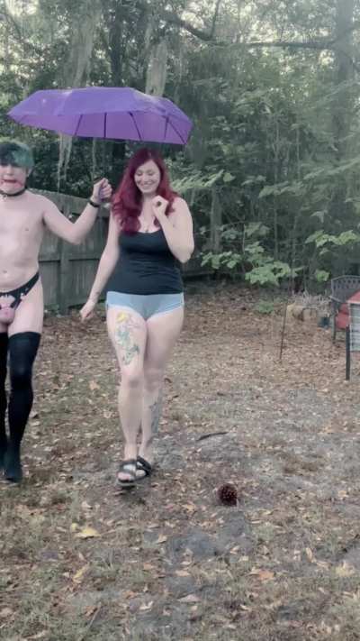 My pussy-free virgin slave in chastity holds my shoping bags and keeps me dry during a storm 🤭😝