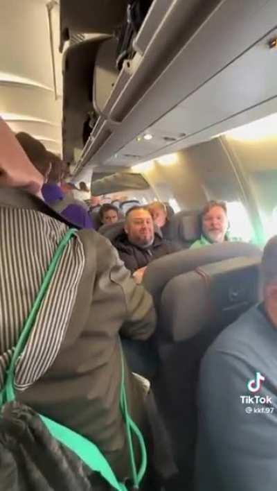 Everyone is staring at me, it’s not like I’m just a person walking down a cramped airplane aisle!