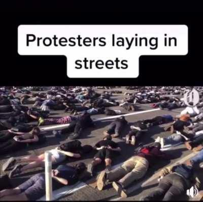Protesters laying in the streets