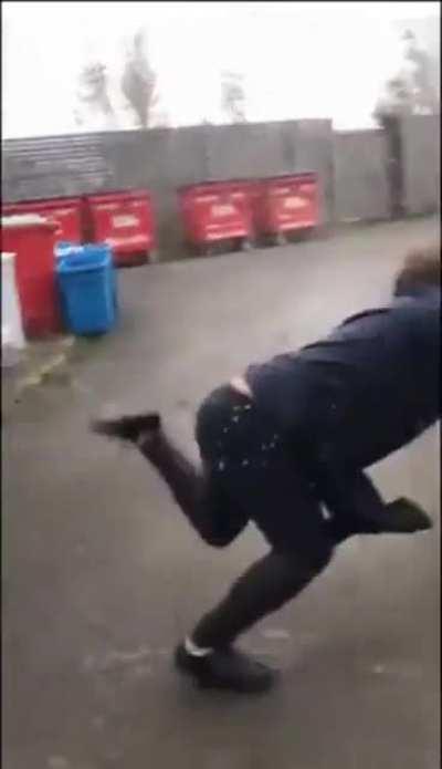 Man jumps on a liquid-filled bag between two poles. What could go wrong?