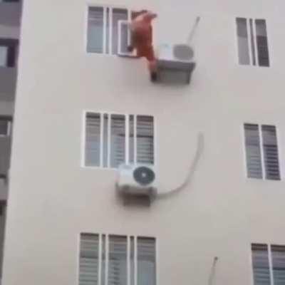 Fireman kicking suicidal people from the window