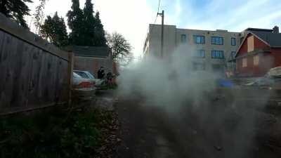 Portland Red House (#4): An Antifa militant runs up behind Portland cops and sprays them with a fire extinguisher.