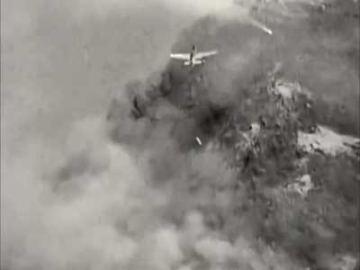 50% hit rate for a USAF F-51D Mustang dropping napalm on a hilltop in Korea in 1951