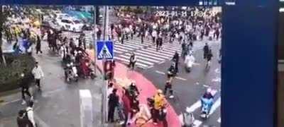 Security cam footage of driver running over pedestrians at busy intersection today in Guangzhou, China. 5 killed, 13 injured.  