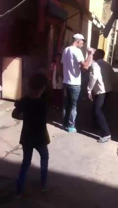 Another young guy tries to harass an older guy.