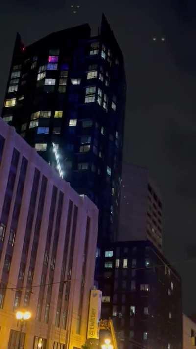 This cool X sign blinding people in the building across
