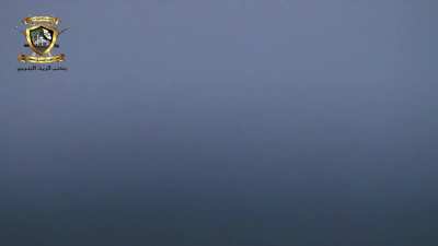 Revolutionary Military Council in Homs ATGM team observes a Syrian Army tank before targeting it with a 9M113 Konkurs missile in the Southern Homs Countryside - May 4, 2013.