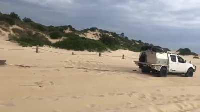Taking the Maserati for a spin on the beach
