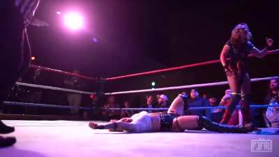 Heidi Howitzer headbutted from on high by Bryn Thorne