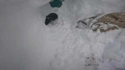 Situationally aware skier saves the life of snowboarder stuck upside down in the snow (NSFW: language)