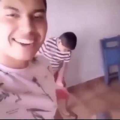 I believe he said something about him looking cute while he mops and calling him a dog.