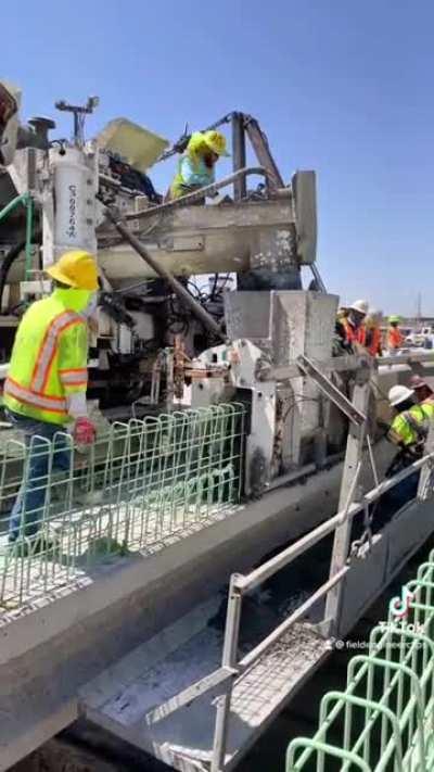 Placing & Forming Side Rail Concrete On A Bridge