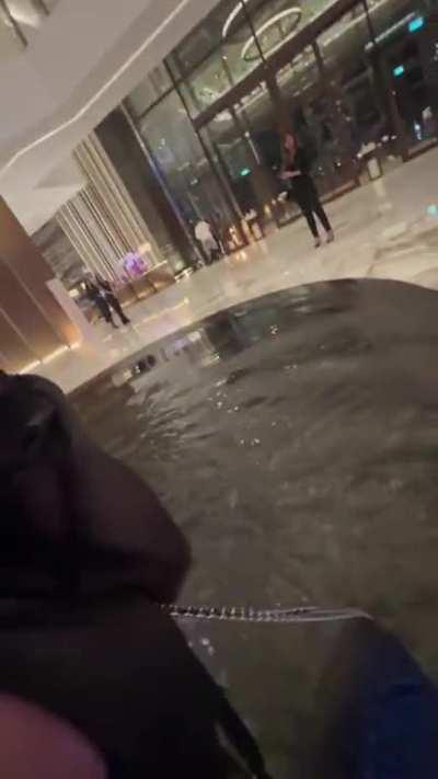 To look at an art piece.