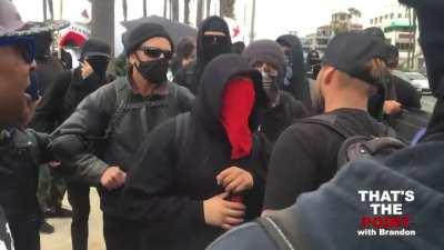 Journalist faces off with mob