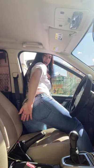 farting on the street in a leather car seat