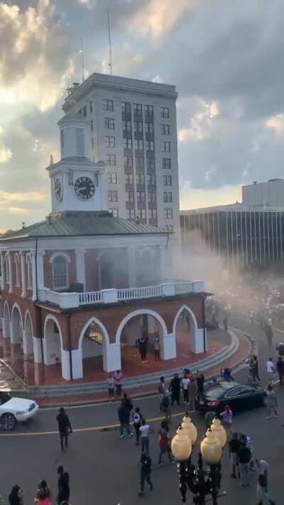 Rioters set market house on fire