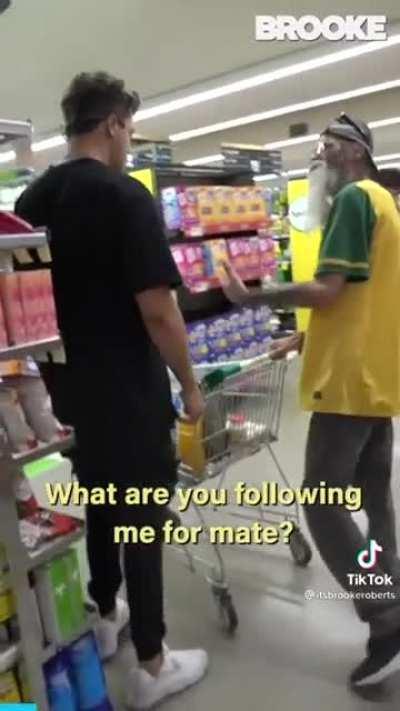Prankster harassing a man just trying to do his shopping