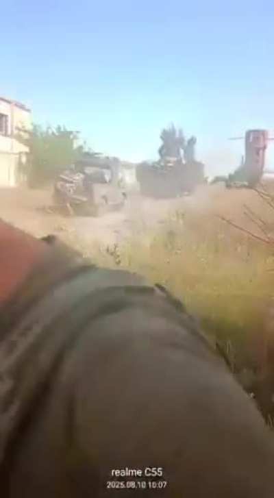 RU POV: Russians are evacuating a trophy M113 APC with a BMP-1 at South Donetsk.