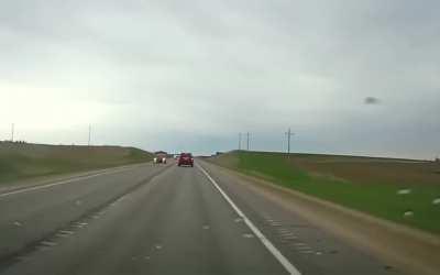 Lady eating KFC in a GMC hits red car and then cammers car