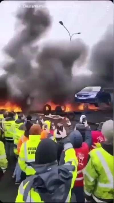 French port worker feed the barricade