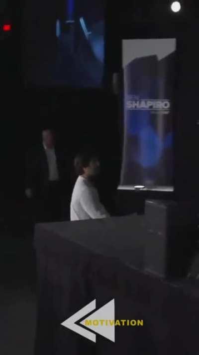 Audience member challenges Ben Shipiro’s height.