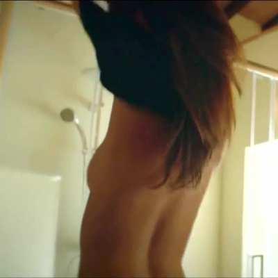 Taking her top off (from Welcome Home)