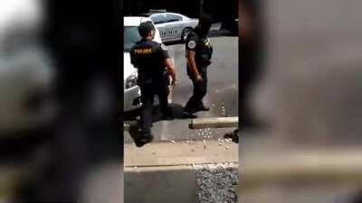 Mother tells off group of cops who are harassing her children