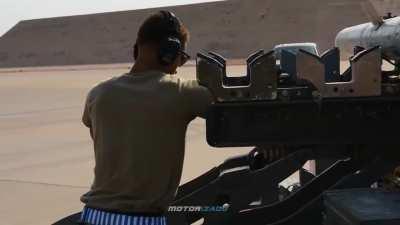 F-15s being armed with AMRAAMs, Sidewinders, cannon rounds and chaff/flares before a sortie