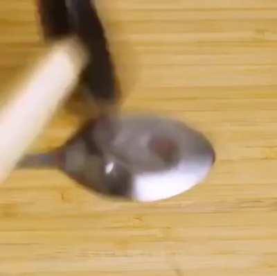 SLPT: Is your spoon not turning the correct way up for you? Simply grab any hammer at your disposal and bang away!