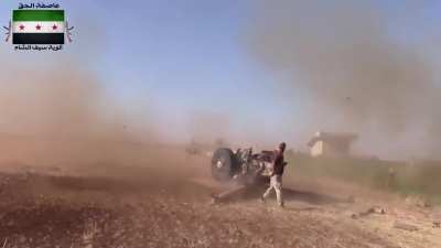 FSA fighters using a captured D-30 howitzer as a direct fire weapon against SAA positions in Daraa - 7/23/2015