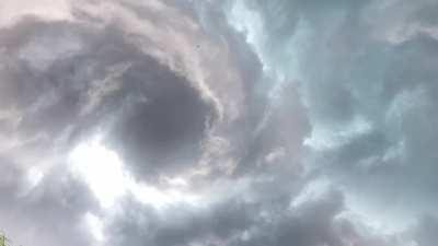 A rare view of a tornado forming while being underneath it!