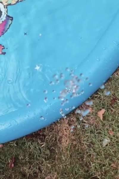 Slow mo of water droplets from our kids summer toy.