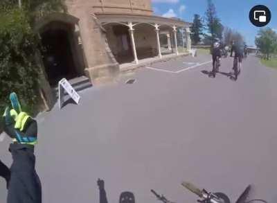 Flipping off a pedestrian while biking on the sidewalk