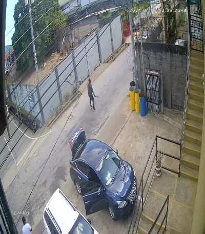 Challenging a car with a machete!