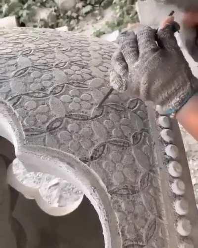 These guys carving a block of stone
