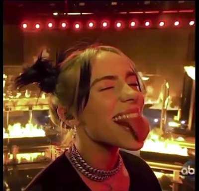 Eyes closed tongue out 👅