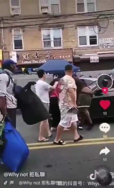 Resident in Brooklyn Chinatown catch a man trying to steal a woman's purse and poke him in the butt with a broom (warning male ass cheeks visible)