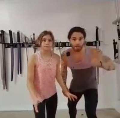 man uses child as punching bag