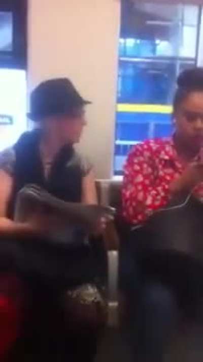 Two women argue about loud music on train