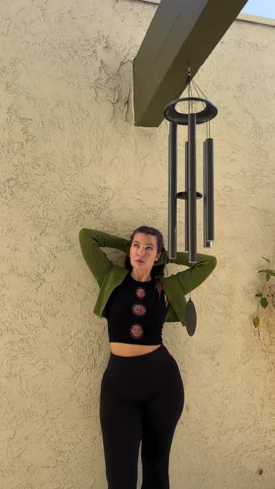 just a cutie forgetting her windchime