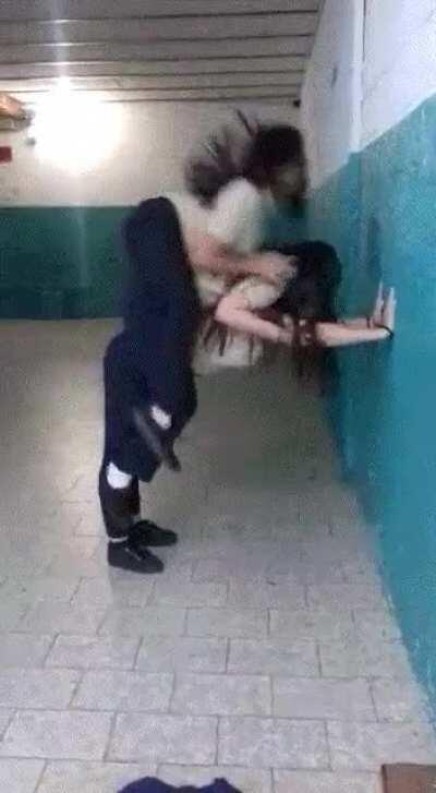 Girls try to stack up on top of each other