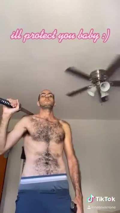 That amount of body hair. The katana gives it the touch.