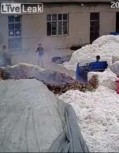 Using a lighter to open plastic bag at a COTTON WAREHOUSE..