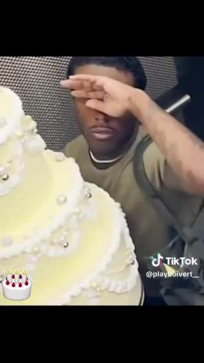 uzi carrying a big ass cake for some reason