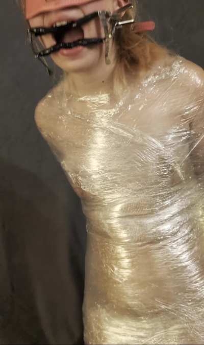 Wrapped up tight on her knees