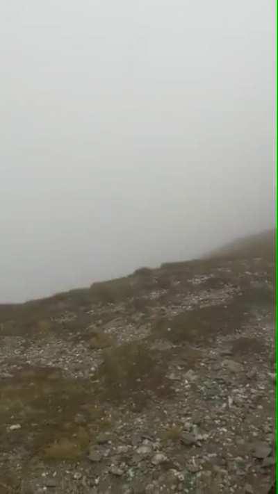 Taking a photo in heavy fucking wind...