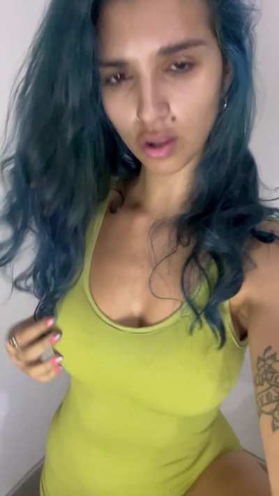 I love how my blue hair matches my green catsuit