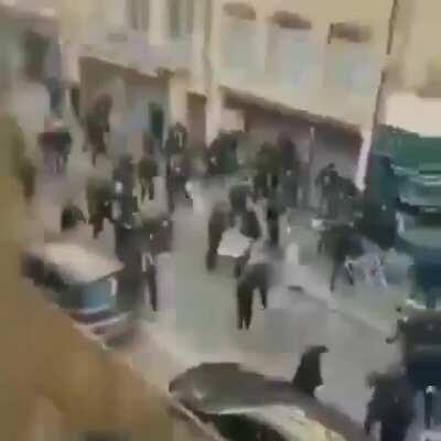 (Left) French supporters attack (right) Utrecht and Sedan supporters