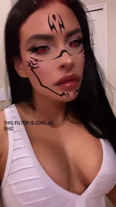 Zelina with a nice cleavage and a weird filter